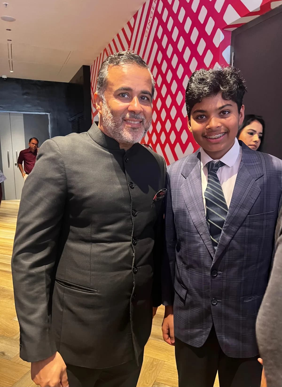Darsh Shhaparia with the author Chetan Bhagat
