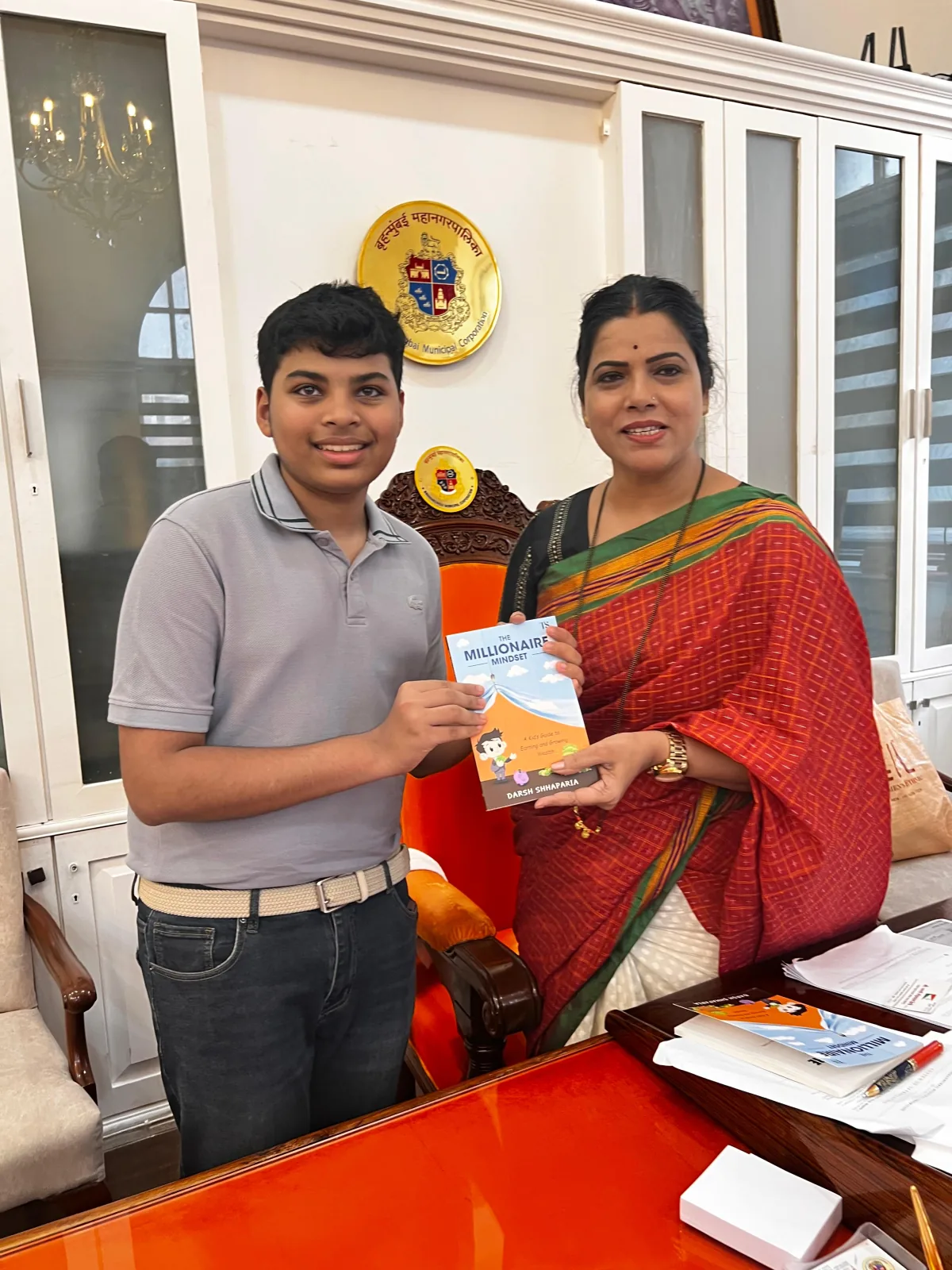 Darsh Shhaparia presenting The Millionaire Mindset to Ritu Tawde