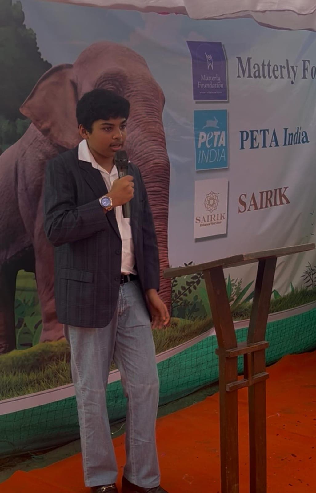 Darsh Shhaparia speaking at a Matterly Foundation and PETA India event